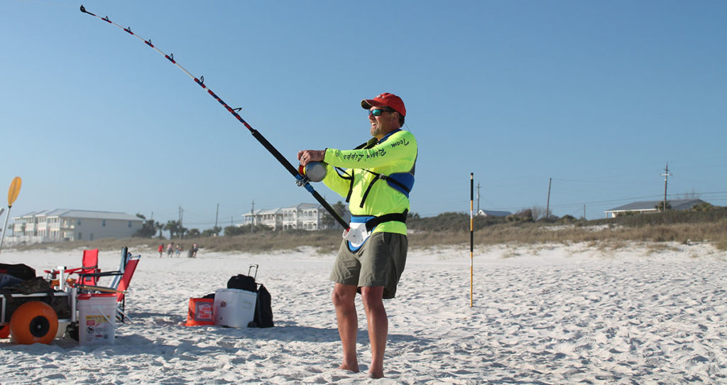 A Florida fisherman shark fishing from the beach.