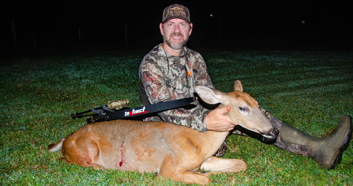 The author with a doe taken with the TideWe Inztinct recurve bow.