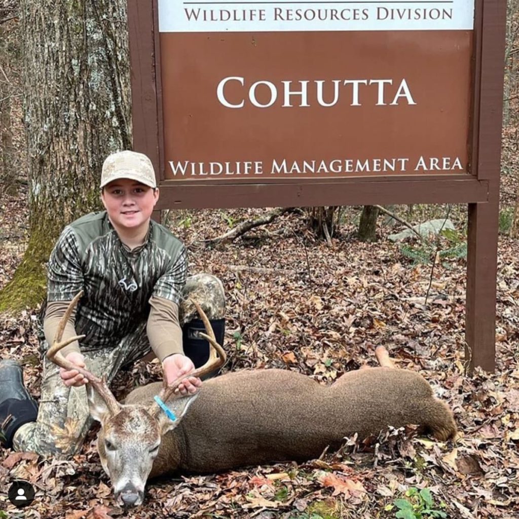 A young hunter with a great buck harvested on Cohutta WMA.
