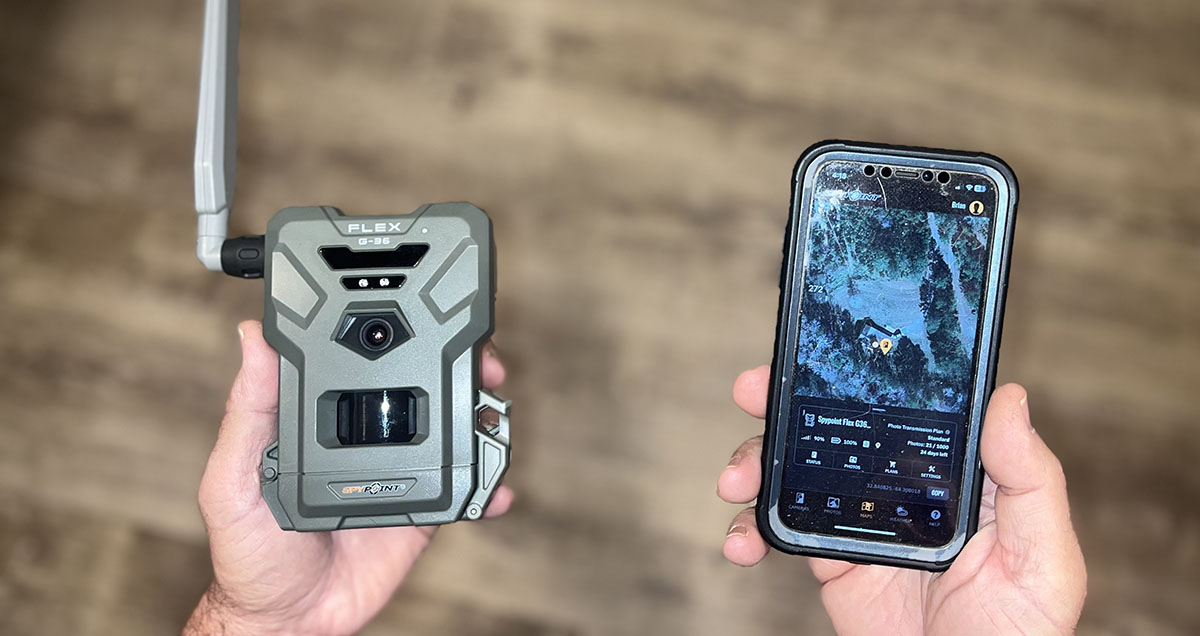 Photo of a cellular trail camera and cell phone.